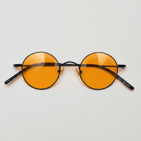 LVY Orange Tinted Lens Sunglasses - Matte black Round Titanium Frame